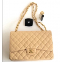 Sumptuous Chanel Maxi Classic Flap Bag A58601 in Caviar Leather Apricot/Gold
