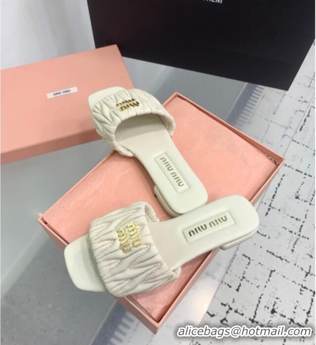 ​Buy Classic Miu Miu Matelasse Nappa Leather Flat Slides Sandal 5XX605 White 2025
