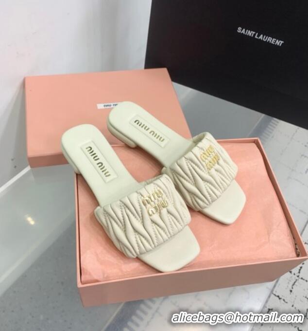 ​Buy Classic Miu Miu Matelasse Nappa Leather Flat Slides Sandal 5XX605 White 2025