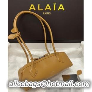 Discount Alaia Le Tecket Small Long Shoulder bag in Grained Leather 68168 Apricot 2025