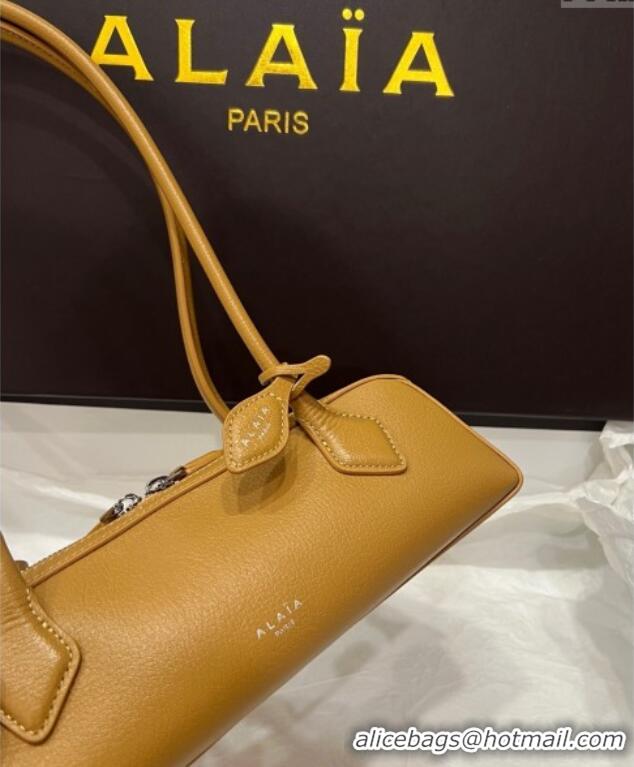 Discount Alaia Le Tecket Small Long Shoulder bag in Grained Leather 68168 Apricot 2025