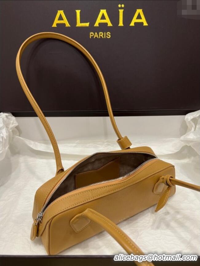Discount Alaia Le Tecket Small Long Shoulder bag in Grained Leather 68168 Apricot 2025