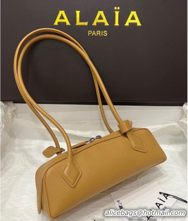 Discount Alaia Le Tecket Small Long Shoulder bag in Grained Leather 68168 Apricot 2025