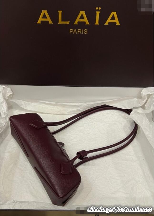 Best Wholesale Alaia Le Tecket Small Long Shoulder bag in Grained Leather 68168 Dark Burgundy 2025