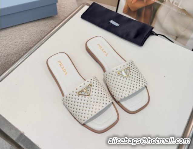 Shop Duplicate Prada Nappa leather flat slides sandal with studs White 2025 1XX760