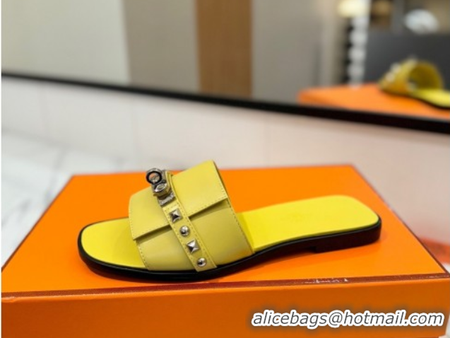 Good Quality Hermes Giulia Flat Slides Sandal in Calfskin Leather with Kelly Buckle and Studs Yellow 0421022