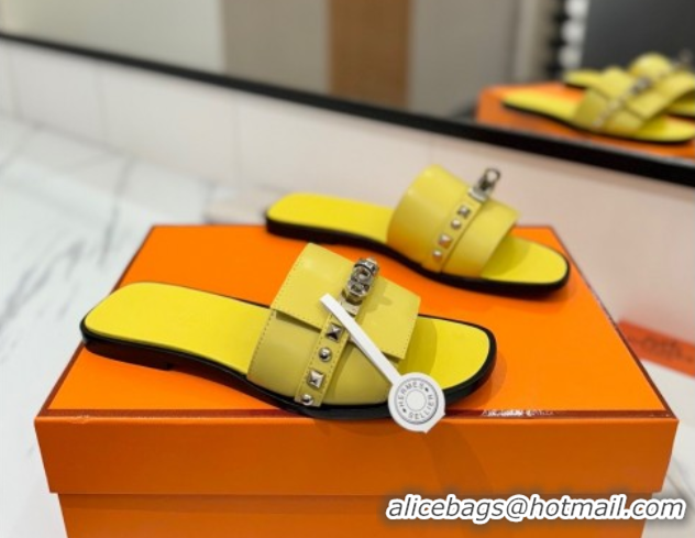 Good Quality Hermes Giulia Flat Slides Sandal in Calfskin Leather with Kelly Buckle and Studs Yellow 0421022