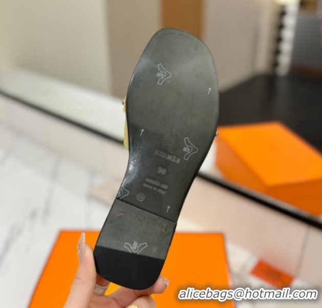 Good Quality Hermes Giulia Flat Slides Sandal in Calfskin Leather with Kelly Buckle and Studs Yellow 0421022