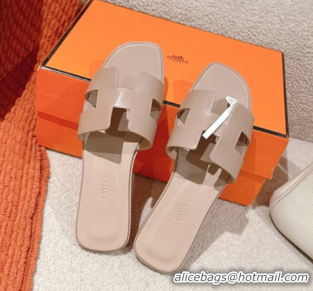 Stylish Hermes Oran Classic Flat Slides Sandal in Smooth Calfskin Nude Pink 0421066