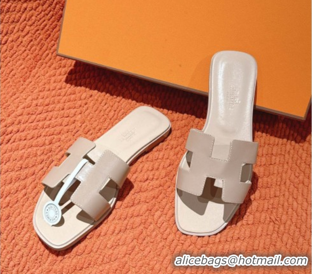Stylish Hermes Oran Classic Flat Slides Sandal in Smooth Calfskin Nude Pink 0421066