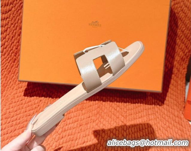 Stylish Hermes Oran Classic Flat Slides Sandal in Smooth Calfskin Nude Pink 0421066
