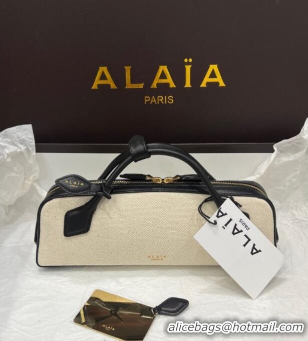 Luxury Discount Alaia Le Tecket Long Clutch bag in Canvas and Leather A5030 Black 2025