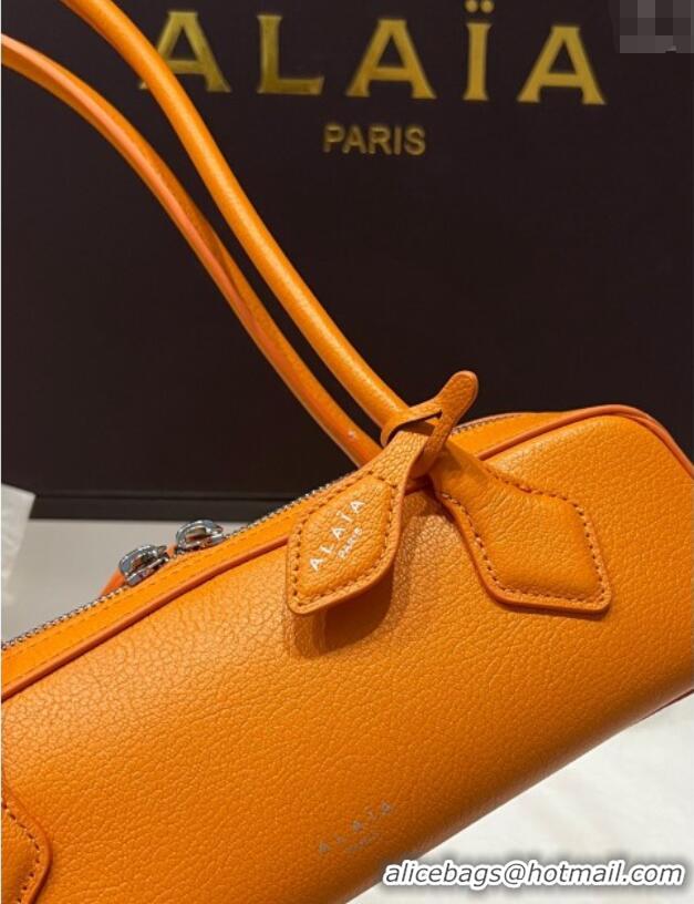 Spot Bulk Alaia Le Tecket Small Long Shoulder bag in Grained Leather A5031 Orange 2025