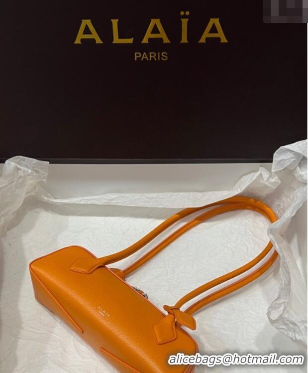 Spot Bulk Alaia Le Tecket Small Long Shoulder bag in Grained Leather A5031 Orange 2025