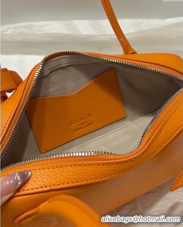 Spot Bulk Alaia Le Tecket Small Long Shoulder bag in Grained Leather A5031 Orange 2025