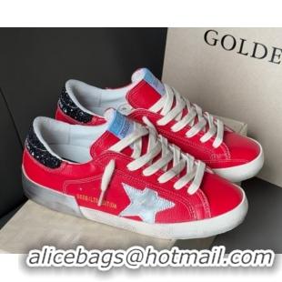 Stylish Golden Goose Women’s Super-Star Sneakers LTD in red nubuck with leather star and glitter heel tab 0605012