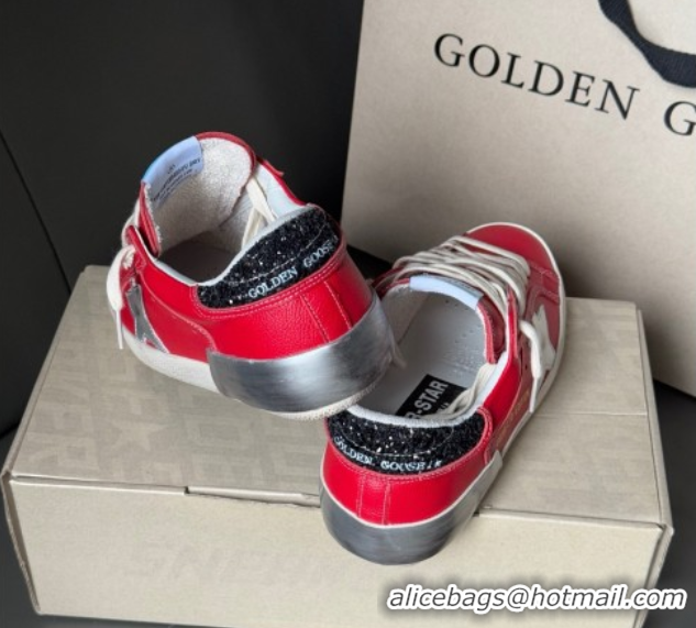 Stylish Golden Goose Women’s Super-Star Sneakers LTD in red nubuck with leather star and glitter heel tab 0605012