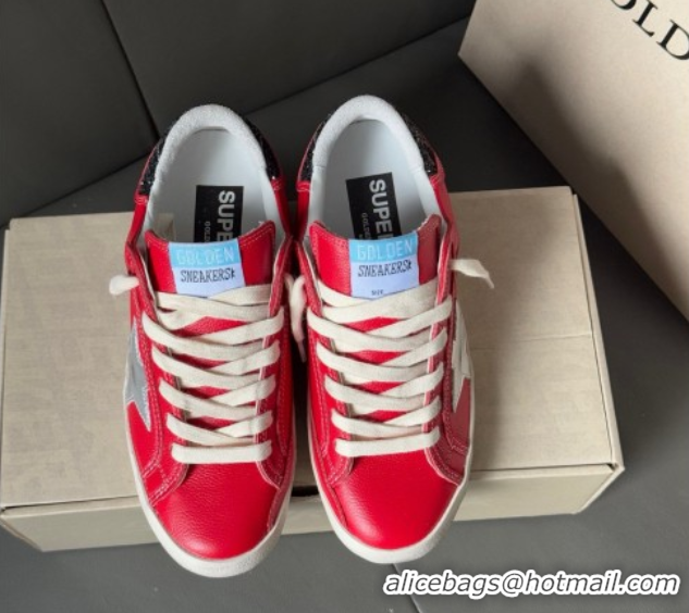 Stylish Golden Goose Women’s Super-Star Sneakers LTD in red nubuck with leather star and glitter heel tab 0605012