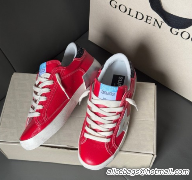 Stylish Golden Goose Women’s Super-Star Sneakers LTD in red nubuck with leather star and glitter heel tab 0605012