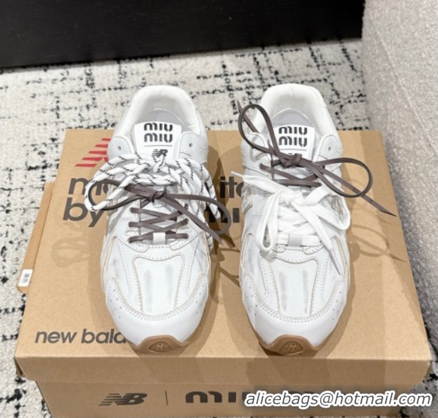 Shop Duplicate New Balance x Miu Miu 530 Sneakers in Faded Leather White 0603138