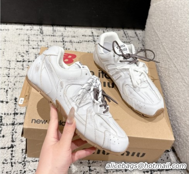 Shop Duplicate New Balance x Miu Miu 530 Sneakers in Faded Leather White 0603138