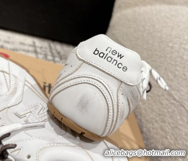 Shop Duplicate New Balance x Miu Miu 530 Sneakers in Faded Leather White 0603138