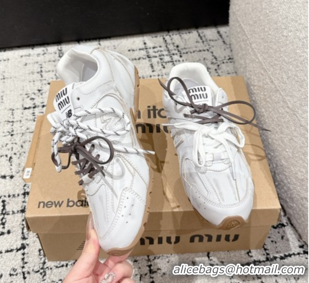 Shop Duplicate New Balance x Miu Miu 530 Sneakers in Faded Leather White 0603138