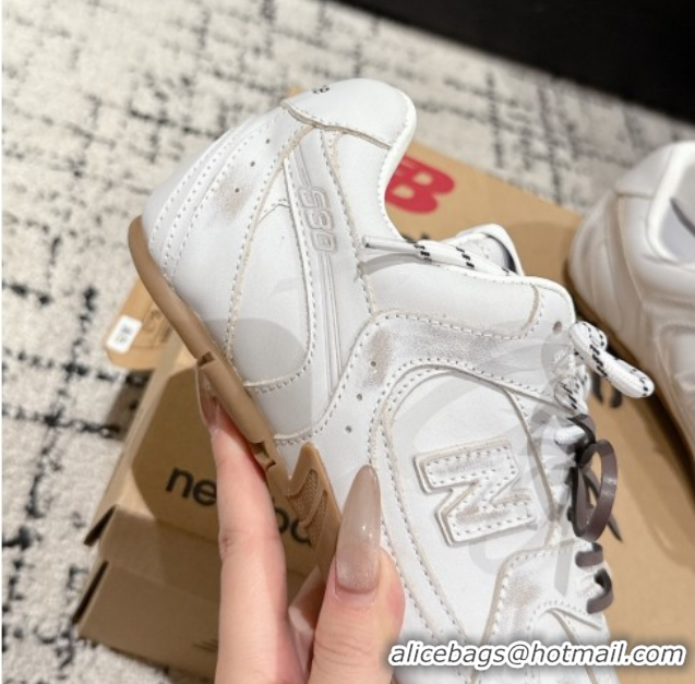 Shop Duplicate New Balance x Miu Miu 530 Sneakers in Faded Leather White 0603138