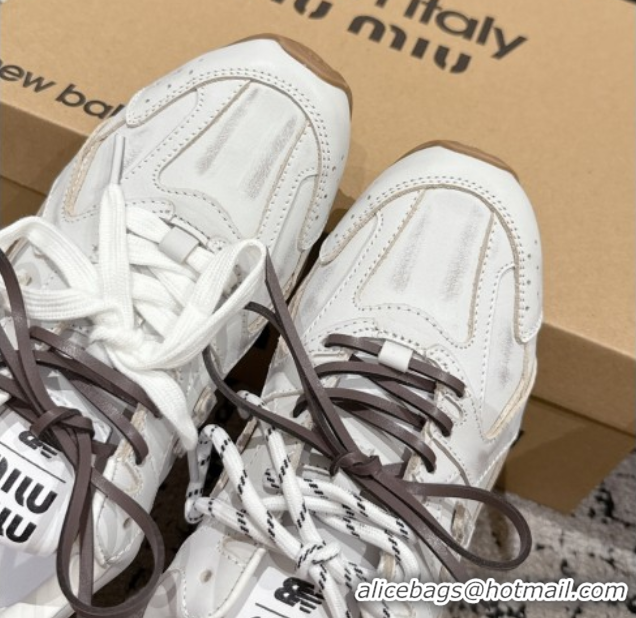 Shop Duplicate New Balance x Miu Miu 530 Sneakers in Faded Leather White 0603138
