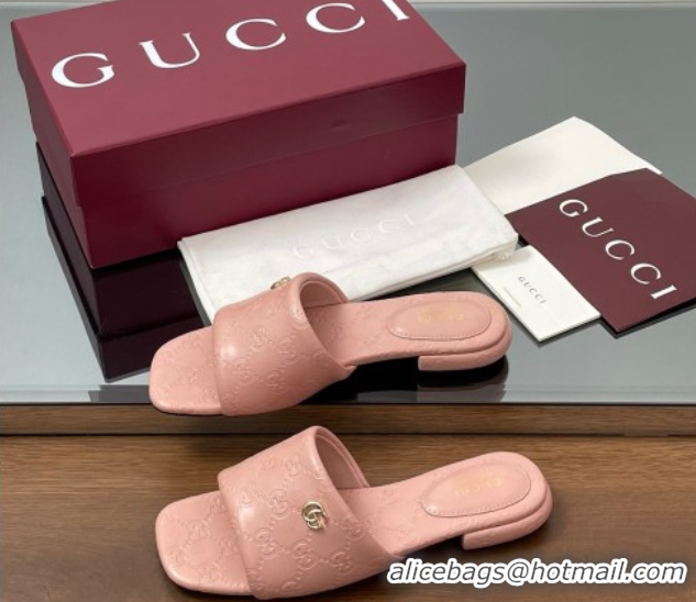 Shop Duplicate Gucci Flat Slides Sandal in GG Calf Leather Light Pink 0609133