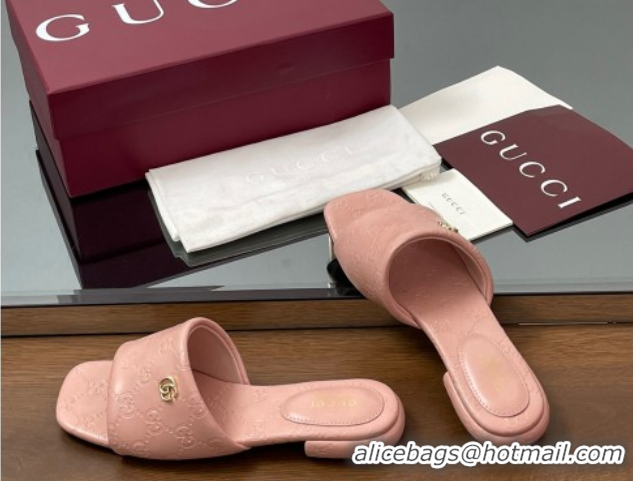 Shop Duplicate Gucci Flat Slides Sandal in GG Calf Leather Light Pink 0609133