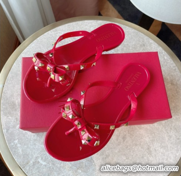 Luxury Discount Valentino Rockstud Rubber Flat Slides Sandal with Bow Red 0711046