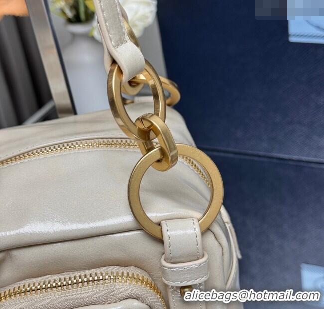 Buy Discount Prada Dangle oil leather top-handle mini-bag 1BB137 Nude 2025