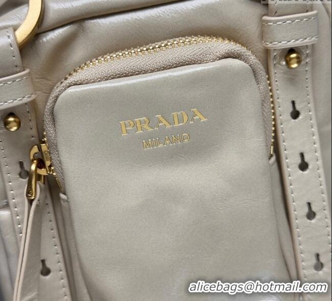 Buy Discount Prada Dangle oil leather top-handle mini-bag 1BB137 Nude 2025