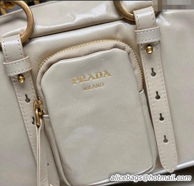 Luxury Cheap Prada Dangle medium oil leather top-handle bag 1BB138 Nude 2025