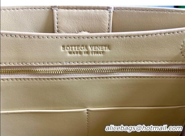 Good Looking Bottega Veneta Small Andiamo Top Handle Bag in Raffia Straw and Leather 743568 Yellow 2025