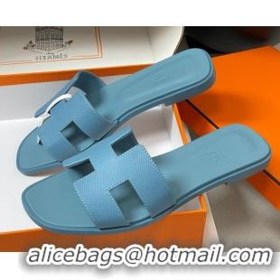 Luxurious Hermes Oran Classic Flat Slides Sandal in Palm-Grained Calfskin Light Blue H081803