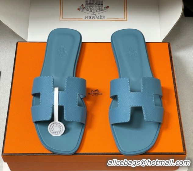 Luxurious Hermes Oran Classic Flat Slides Sandal in Palm-Grained Calfskin Light Blue H081803