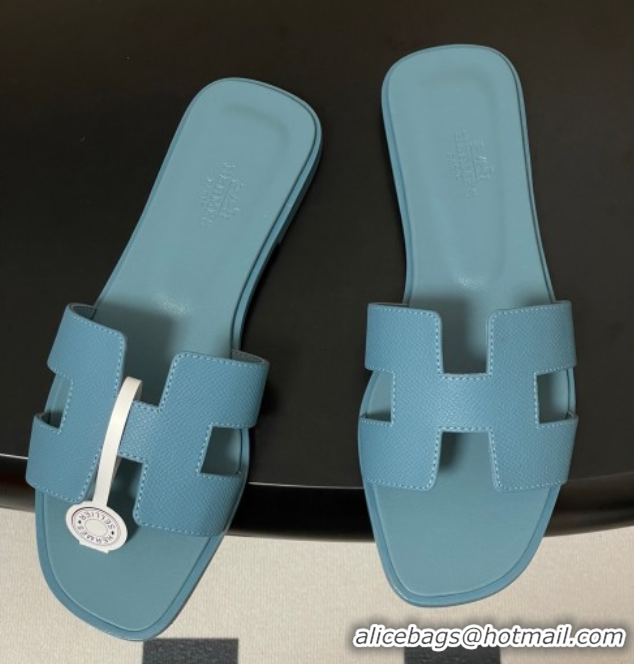 Luxurious Hermes Oran Classic Flat Slides Sandal in Palm-Grained Calfskin Light Blue H081803
