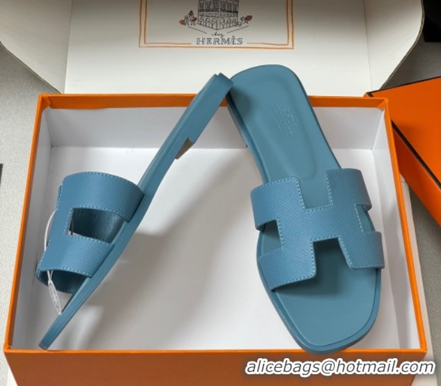 Luxurious Hermes Oran Classic Flat Slides Sandal in Palm-Grained Calfskin Light Blue H081803