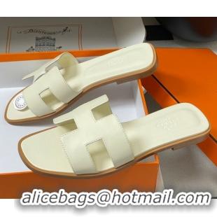 Buy Luxury Hermes Oran Classic Flat Slides Sandal in Smooth Calfskin Pale Yellow 2025 H081803
