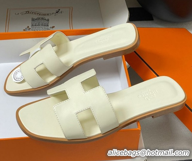 Buy Luxury Hermes Oran Classic Flat Slides Sandal in Smooth Calfskin Pale Yellow 2025 H081803