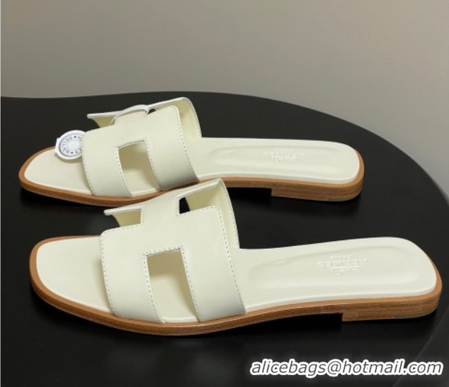Buy Luxury Hermes Oran Classic Flat Slides Sandal in Smooth Calfskin Pale Yellow 2025 H081803