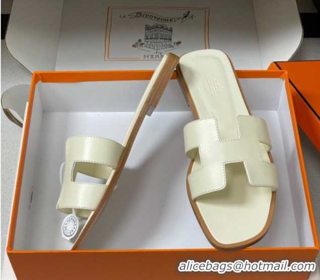 Buy Luxury Hermes Oran Classic Flat Slides Sandal in Smooth Calfskin Pale Yellow 2025 H081803