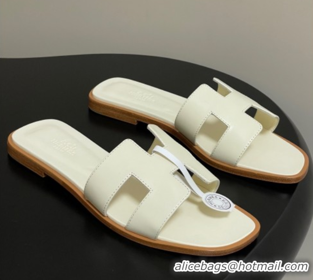 Buy Luxury Hermes Oran Classic Flat Slides Sandal in Smooth Calfskin Pale Yellow 2025 H081803