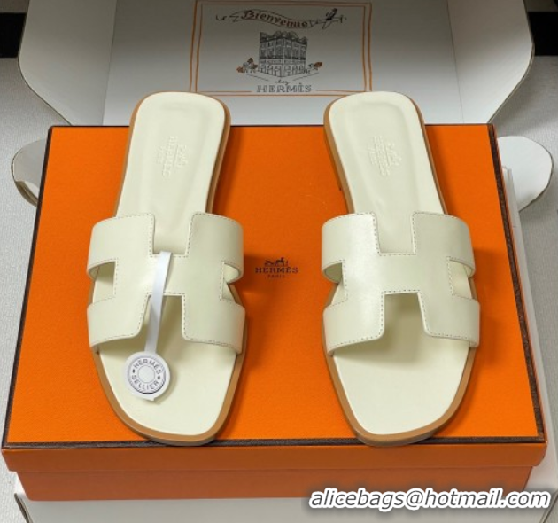 Buy Luxury Hermes Oran Classic Flat Slides Sandal in Smooth Calfskin Pale Yellow 2025 H081803