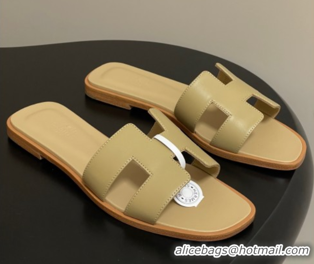 Shop Duplicate Hermes Oran Classic Flat Slides Sandal in Smooth Calfskin Beige 2025 H081803