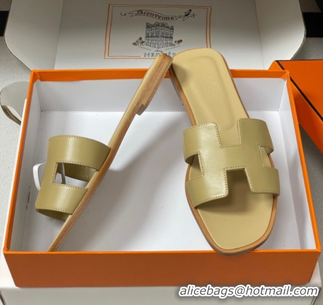Shop Duplicate Hermes Oran Classic Flat Slides Sandal in Smooth Calfskin Beige 2025 H081803