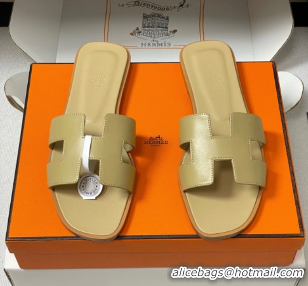 Shop Duplicate Hermes Oran Classic Flat Slides Sandal in Smooth Calfskin Beige 2025 H081803