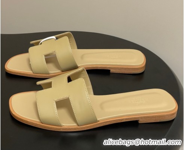 Shop Duplicate Hermes Oran Classic Flat Slides Sandal in Smooth Calfskin Beige 2025 H081803